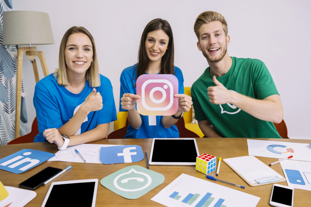 eam promoting social media marketing services in India with Instagram and other platform icons.